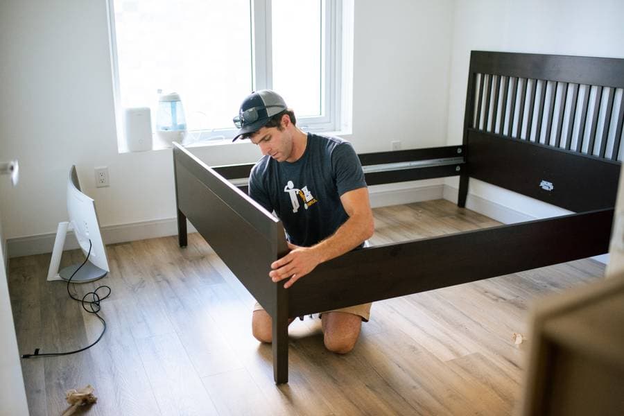 Small Haul crew assembling furniture