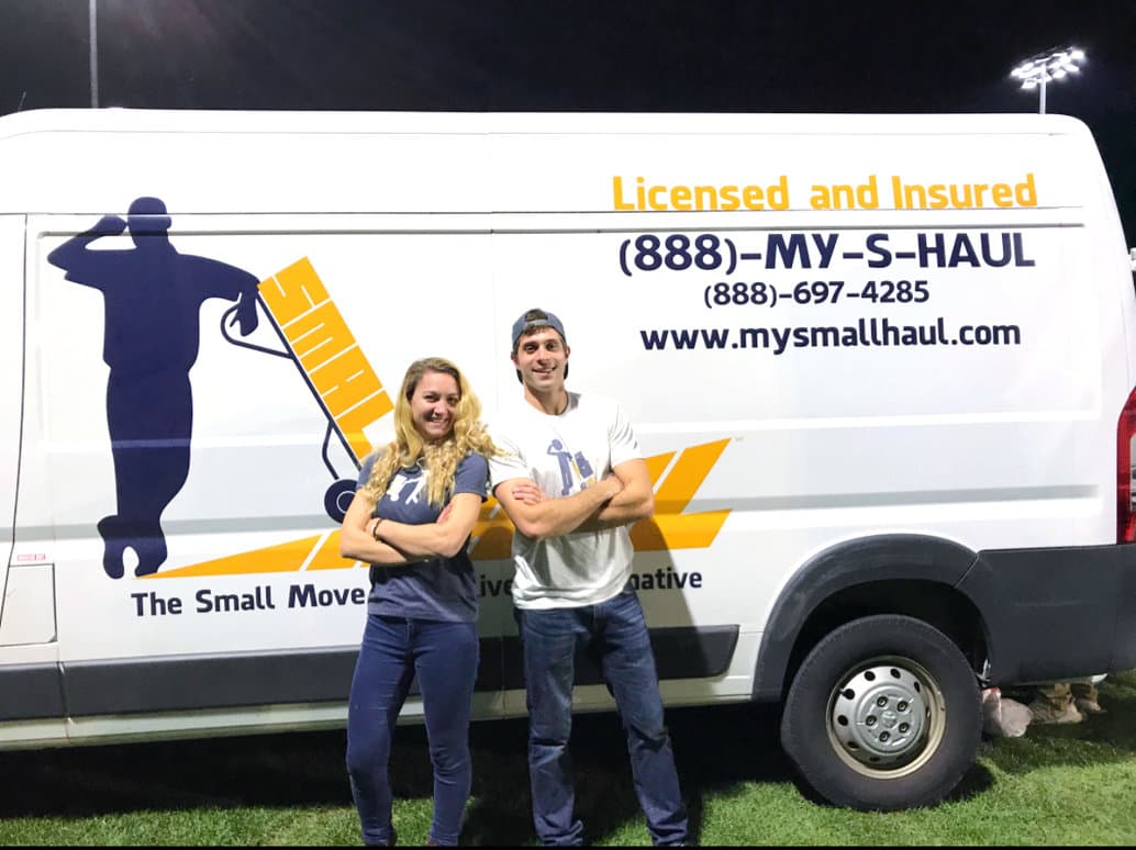 The original Small Haul van, wrapped Licensed and Insured, with Charles and Azuraye